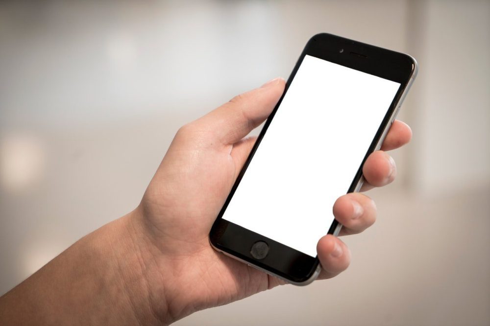 hand person holding phone