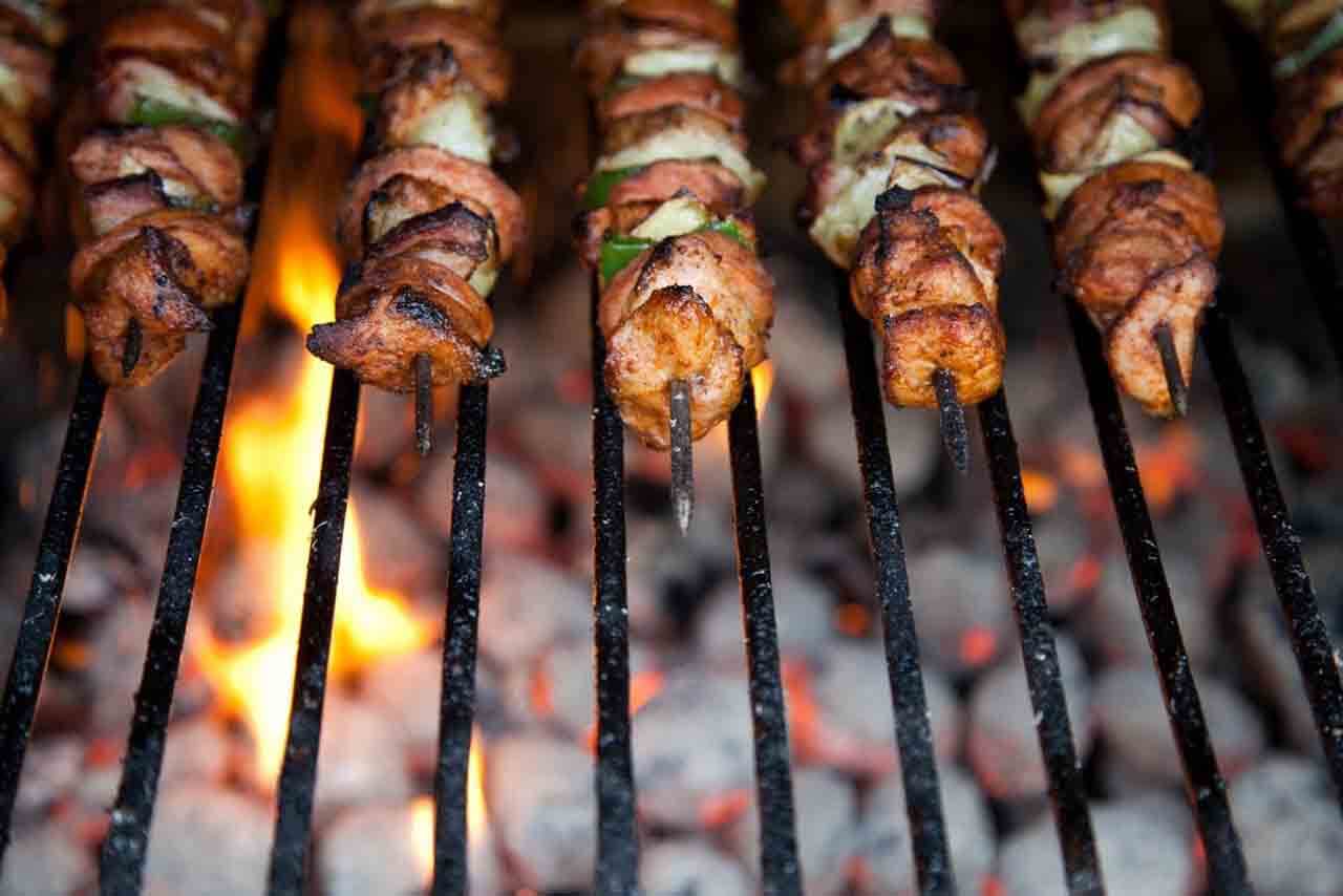 cast iron vs stainless steel grill