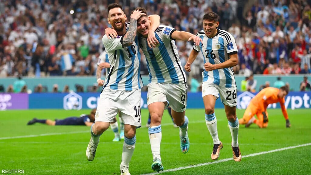 Julian Alvarez with Lionel Messi