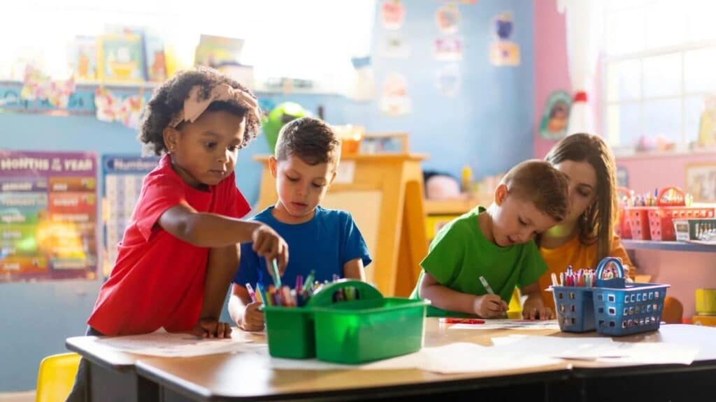 Childern learning and growing with their teacher in a daycare environment