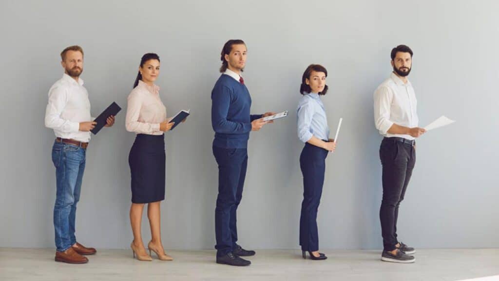 Group of job candidates standing in a line