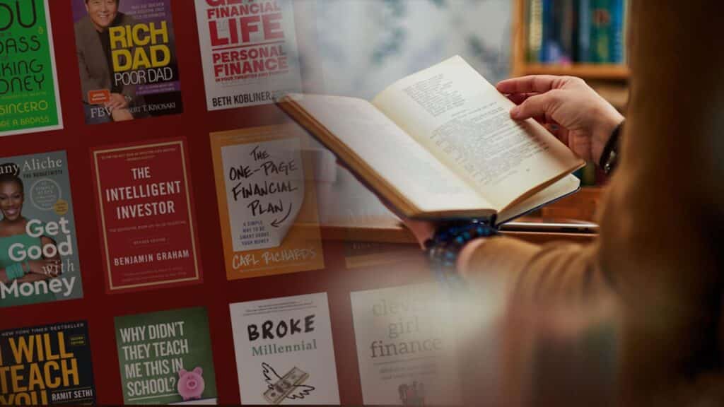 A person reading a book on personal finance