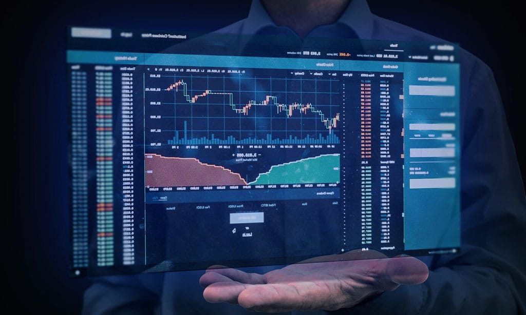 Man holding a holographic financial trading dashboard.
