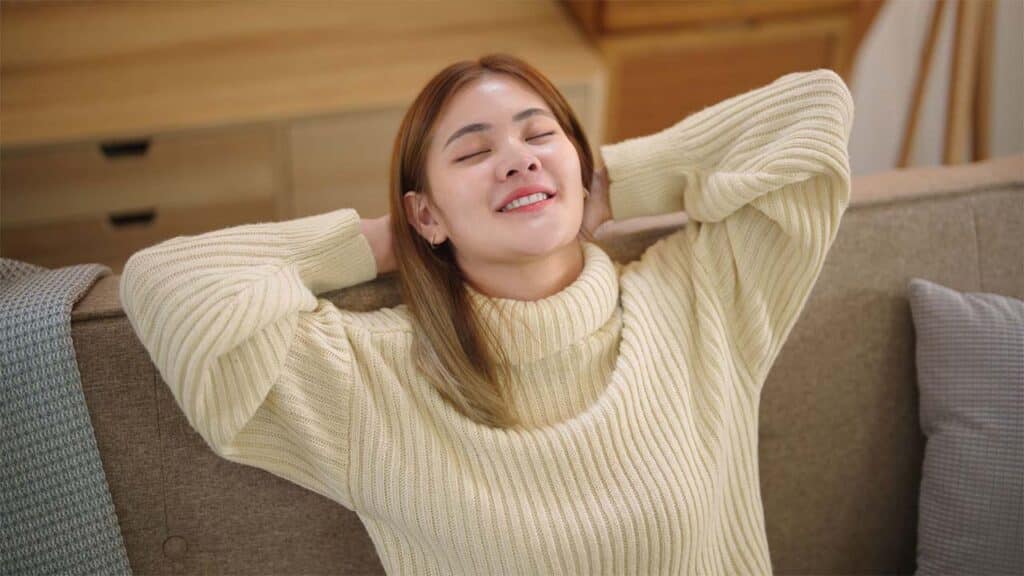 Young woman relaxing on a couch