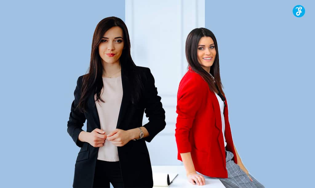 Two professional women dressed in stylish business attire