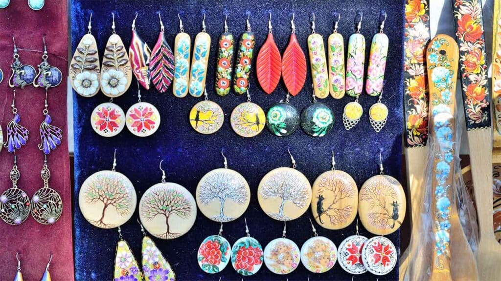 Colorful handmade earrings on display
