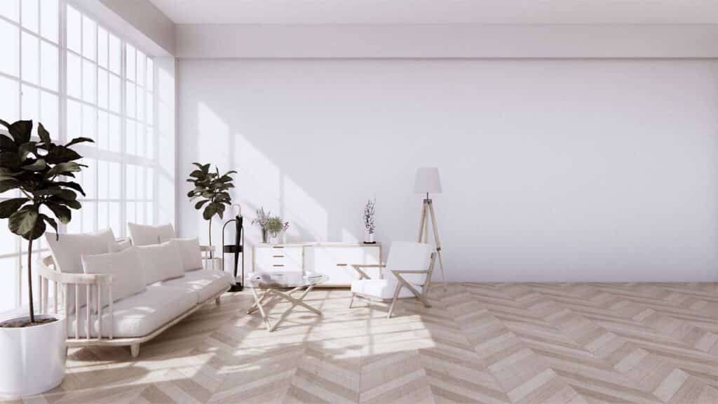 The herringbone-patterned wooden floor
