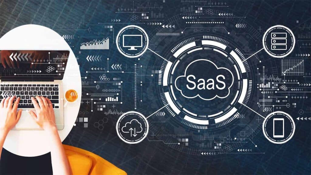 Person working on a laptop with SaaS (Software as a Service) technology concept